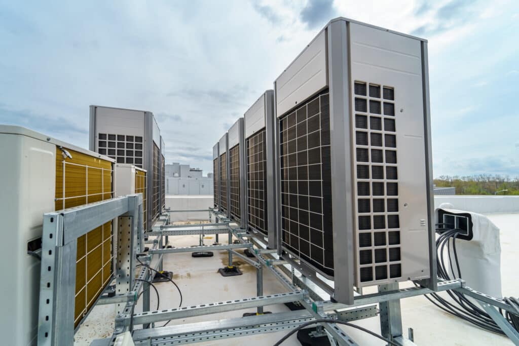 commercial hvac repair Commercial rooftop HVAC unit in Los Angeles being professionally serviced by certified technician