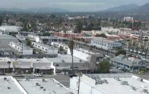 Commercial HVAC technician inspecting chiller on Los Angeles rooftop